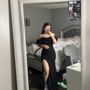 Black long sparkly black dress with high slit.